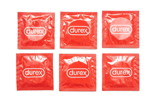 Vinnytsia, Ukraine - 08 October 2021, Set of six Durex condoms in red packages isolated in white background