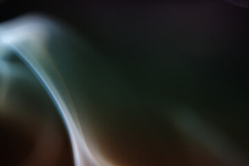 Smoke from the cigarette has a higher temperature than the surrounding giving it lower density which makes it rise