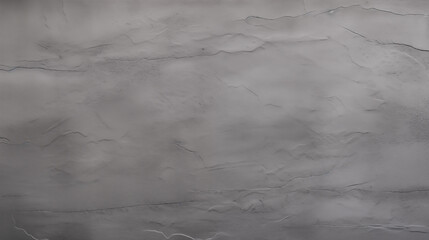 Smooth Grey Plaster Wall with Subtle Cracks and Minimal Texture