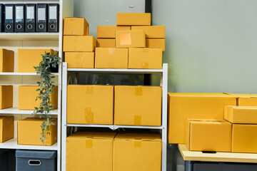  desk with a cardboard box sits alone in office, reflecting a quiet moment in retail and distribution. The space is ready for delivering packages and handling merchandise without any people present.