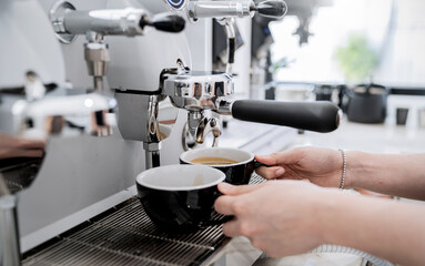 Startup successful small business owner sme man, handsome asia boy use coffee machine in coffee shop restaurant