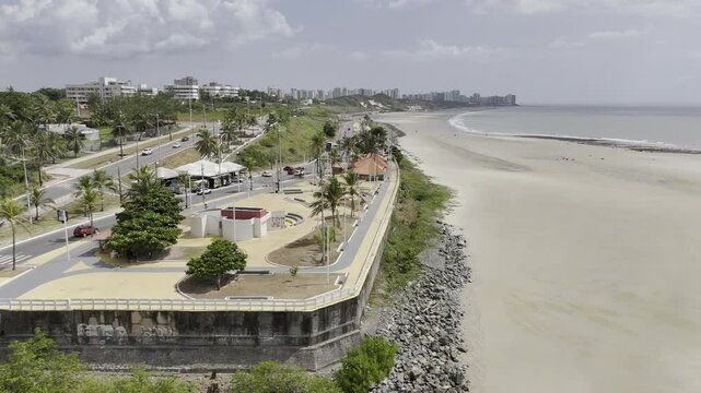 Drone orbits to the right around Parquinho da Litor&acirc;nea on sunny afternoon in Sao Luis, Maranh&atilde;o, Brazil