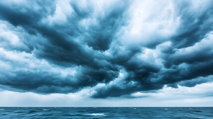 Fototapeta premium The sky is filled with dark clouds and the sun is barely visible
