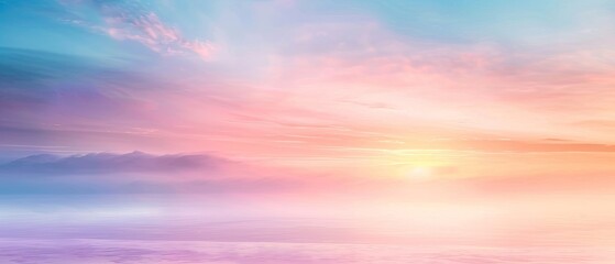 Obraz premium Dreamy Pastel Sunset Over Misty Mountains and a Calm Sea