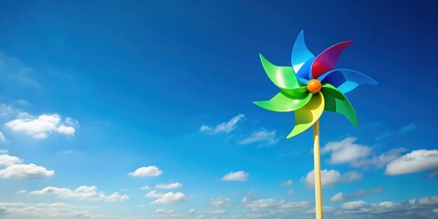 Wind turbine toy in a clear sky, promoting energy conservation, wind turbine, toy, sky, energy, conservation, eco-friendly