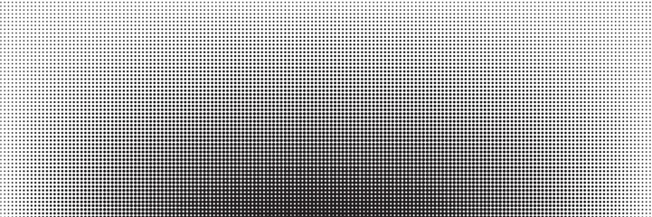 Abstract halftone dots texture background. Grunge black and white backdrop.