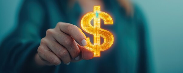 A person is holding a dollar sign in their hand