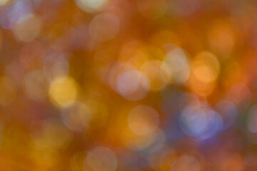 Unfocused colorful season. Bokeh autumn leaves. Fall blurred background orange color. Fall nature. Blurred bokeh background. Autumn nature. Blur backdrop of autumn leaves. Shallow depth of field