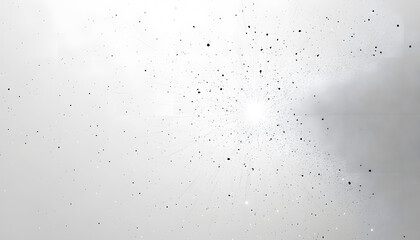 Obraz premium A mostly blank background with a small, centered design, like a tiny star or dot, emphasizing simplicity and space