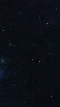 Deep blue night sky with stars, and nebula moving to the right. vertical video 4k.
