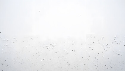 Obraz premium A mostly blank background with a small, centered design, like a tiny star or dot, emphasizing simplicity and space