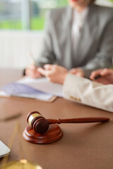 Gavel and legal documents during contract discussion
