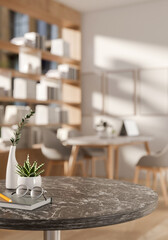 A black marble round table in a minimalist cafe, co-working space, or library.