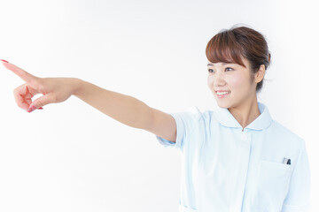 Fototapeta premium 指を指す看護師