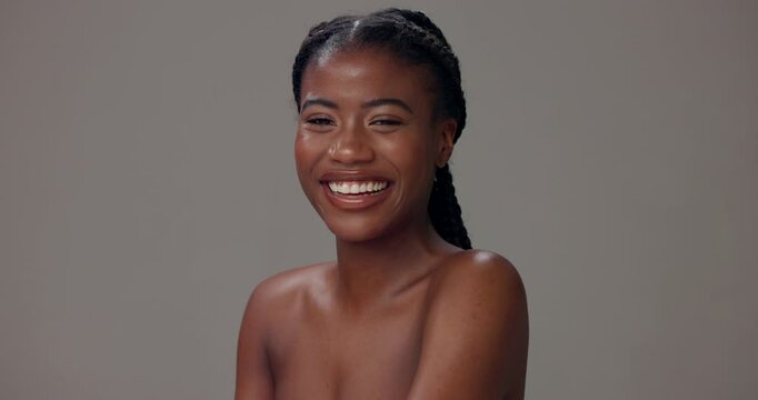Black woman, portrait and smile in studio for skincare, confidence or natural beauty. Happy, clear skin or person on gray background with cosmetics, luxury glow or dermatology for wellness in Nigeria