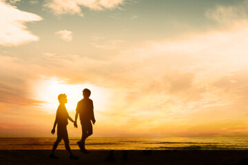 happy couple in the sea on nature travel silhouette