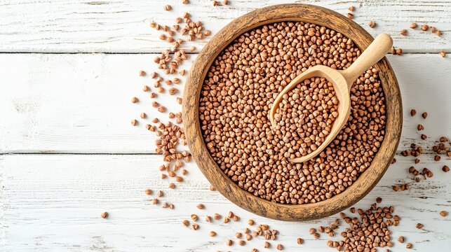 Buckwheat grains in a wooden bowl