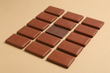 Brown chocolate bars on a light background