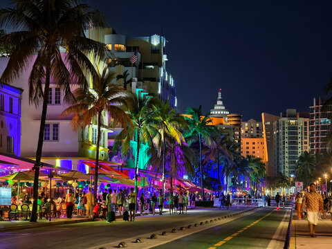 Miami Beach, Florida - Nightlife scene on Ocean Drive in South Beach, filled with al fresco restaurants and art deco buildings.