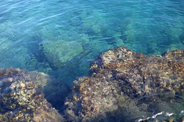 Beautiful beach, coast and bay with crystal clear sea water seen from above
