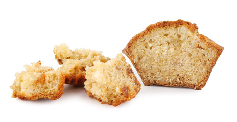 Muffin and muffin pieces isolated on white background.