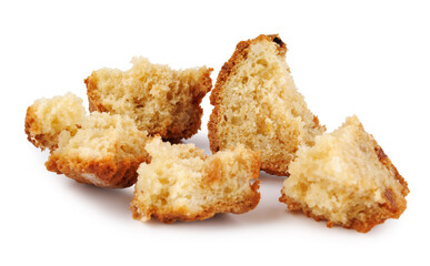Muffin crumbled into pieces isolated on a white background.