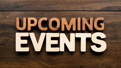 upcoming events word brown wood letters on plain white background