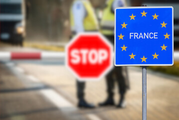 Stop sign, barrier and control at the border with France