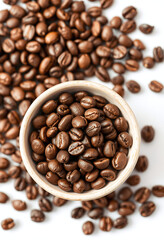 Fototapeta premium coffee beans in a cup
