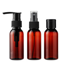Amber glass bottles with various dispensers for cosmetics or skincare products