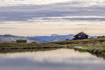 Norwegian landscape with traditional old houses, Dovrefjell area