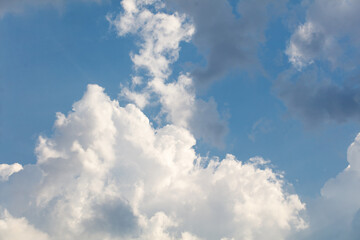 Clouds on the blue sky as a background