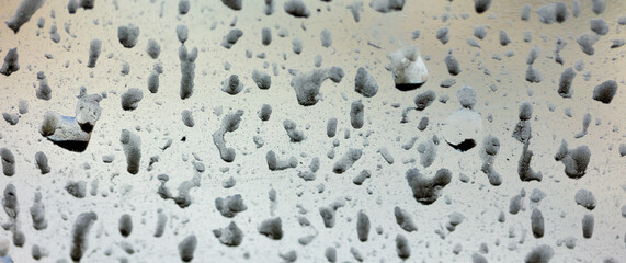 Dirt on the car glass. Abstract background