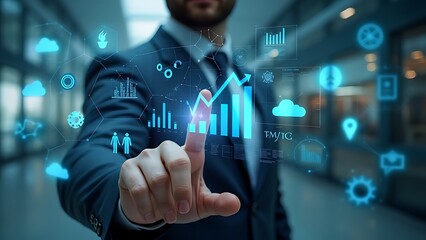 Businessman hand working with new modern computer and business graph.