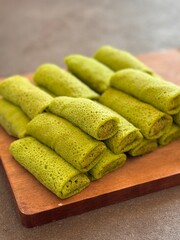 indonesian traditional coconut pandan pancake, dadar gulung

