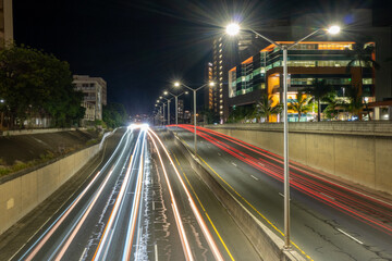 Obraz premium Busy night streets of the Honolulu city, Hawaii