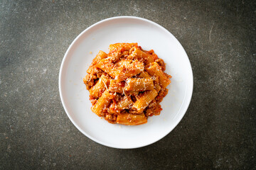 Rigatoni pasta bolognese with cheese