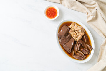 stewed duck offal in brown soup