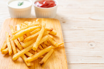 French fries with sour cream and ketchup
