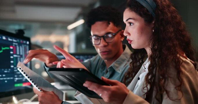 Technology, charts and business people with conversation in office for investment, coaching and support. Investor, man and woman with tablet for crypto mining, portfolio and review of trading signals