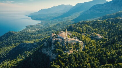 Fototapeta premium Bird's-eye view of Mount Athos and its surrounding monasteries, with rugged terrain and dense forests