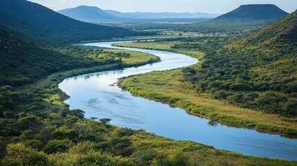 Fototapeta premium Top view of the serene landscapes around the Olifants River, with winding watercourses and bushveld terrain