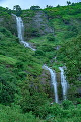 A waterfall during the monsoons near Pune India. Monsoon is the annual rainy season in India from June to September.