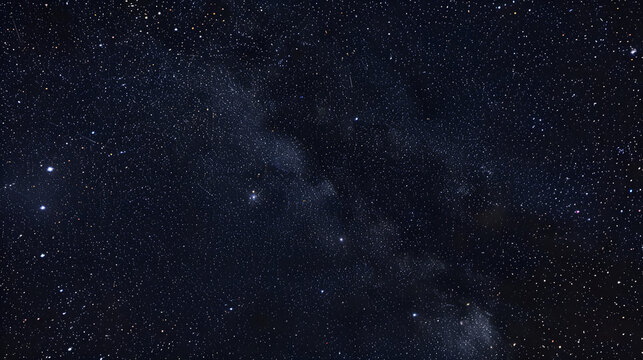 A serene night sky with the constellation of Cassiopeia visible among the stars.