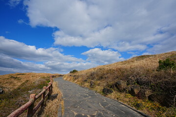 seaside walkway and charming clouds