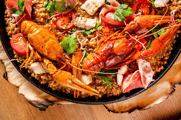 seafood paella on the wooden board