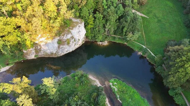 Aerial footage of tilt and circle over famous rock (Amaliafelsen) at the Danube River near Sigmaringen