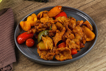 Asian cuisine - roasted crocodile meat