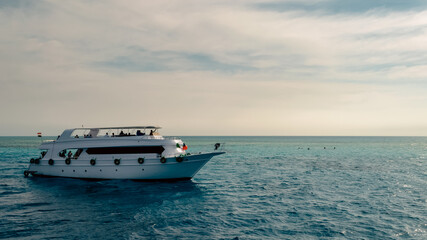 tourists on white boats in the Red Sea Egypt
