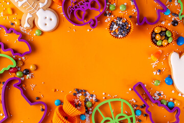 Bright colorful Halloween cookies and sweet background